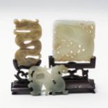 A CHINESE JADE 'HORSE AND MELON' PLAQUE Carved as a horse with a two melons suspended from a vine