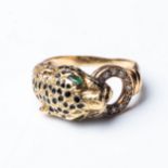 A GOLD CARTIER-STYLE LEOPARD RING Pavé-set with 0,20 carats of round brilliant-cut diamonds, GH