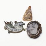 A CHINESE GREEN HARDSTONE CARVING OF A PHOENIX Together with another foliate carving, and another