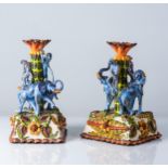 A PAIR OF ARDMORE CANDLEHOLDERS, 2007 With elephants and monkeys flanking a central column, made