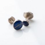 A PAIR OF SILVER LAPIS LAZULI CUFFLINKS, CONTINENTAL Circular with solid back piece, with matching