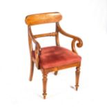 A REGENCY-STYLE MAHOGANY ARMCHAIR With shaped top rail and cross bar, down scrolled arms,