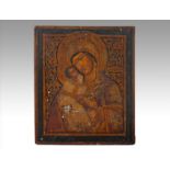 A RUSSIAN TEMPERA ON WOOD 'VLADIMIR MOTHER OF GOD' ICON, 19TH CENTURY Painted to the center with the