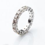 A DIAMOND ETERNITY RING 1,50 CARATS Round brilliant-cut claw-set diamonds in a 9ct white gold