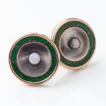 A PAIR OF EARRINGS Green enamel and opal center in 9ct rose gold, circa 1930