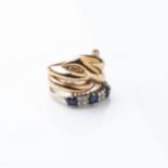 A SAPPHIRE AND DIAMOND RING WITH AN UNASSOCIATED GOLD DRESS RING Claw-set with 3 princess-cut