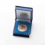 A BRONZE ROVOS RAIL MEDALLION Boxed, sealed, with papers