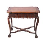 A CAPE STINKWOOD CENTRE TABLE, 19TH CENTURY The rectangular top with shaped moulded edge above