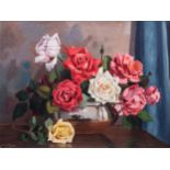 Dino Paravano (South African 1935 - ): STILL LIFE WITH ROSES signed oil on board 45,5 by 61cm