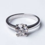 A DIAMOND SOLITAIRE RING 1,59 CARATS Claw-set to the center with a round brilliant-cut diamond