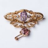 A PEARL AND GEM-SET BROOCH Bezel-set to the center with an oval gemstone, possibly amethyst, and