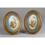 A PAIR OF FRAMED SEVRES PORCELAIN WALL PLAQUES, LATE 19TH/EARLY 20TH CENTURY Oval, each centrally