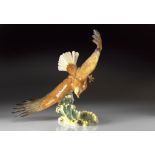 A HUTSCHENREUTHER PORCELAIN FIGURE OF A SEA EAGLE IN FLIGHT