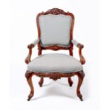 A WALNUT AND UPHOLSTERED ARMCHAIR, LATE 19TH CENTURY