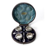 A CASED SET OF FOUR VICTORIAN SILVER SALTS, WILLIAM HUTTON AND SONS, LONDON, 1878