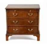A GEORGE III STYLE WALNUT BACHELOR'S CHEST OF DRAWERS
