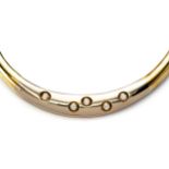 A DIAMOND AND TWO-TONED 14CT GOLD HINGED CHOKER