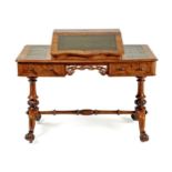 A VICTORIAN WALNUT WRITING DESK