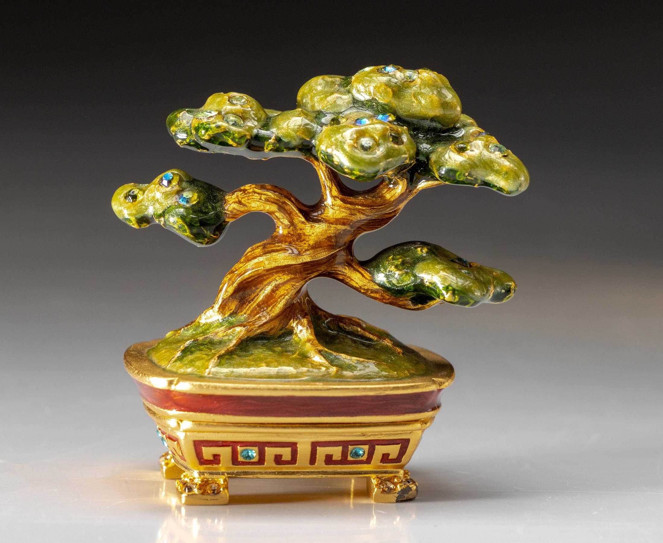 AN ESTEE LAUDER SOLID PERFUME COMPACT, MAGNIFICENT BONSAI - DESIGNED BY JAY STRONGWATER, 2007