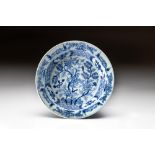 A CHINESE BLUE AND WHITE 'MANDARIN DUCK AND PEONY' PLATE, QING DYNASTY, QIANLONG