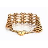 A 9CT GOLD GATE-LINK BRACELET