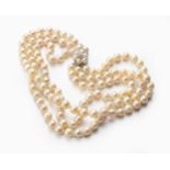 A TRIPLE-STRAND PEARL NECKLACE