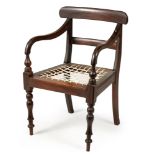 A CAPE STINKWOOD REGENCY ARMCHAIR