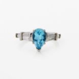 A BLUE TOPAZ AND DIAMOND RING