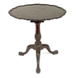 A GEORGE III MAHOGANY TRIPOD PIE CRUST TABLE