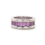 A PINK SAPPHIRE AND DIAMOND ETERNITY RING