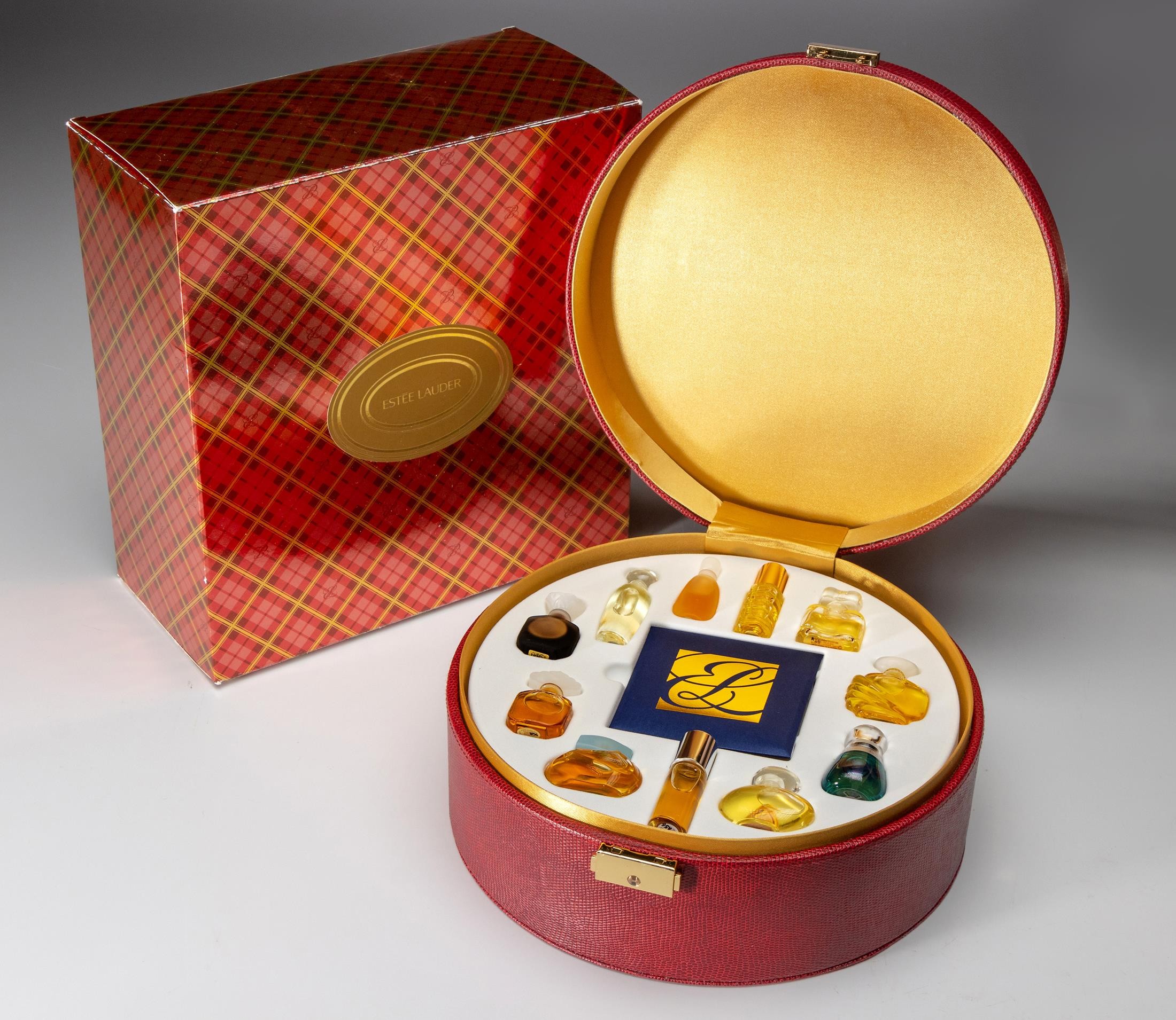 AN ESTEE LAUDER HOUSE OF FRAGRANCE CASE COFFRET