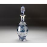 A BLUE TO CLEAR-CUT DECANTER