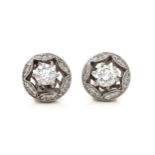 A PAIR OF DIAMOND EARRINGS