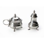 AN INDIAN SILVER MUSTARD POT AND PEPPERETTE, WARNER BROTHERS, CIRCA 1920