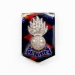 A CASED DIAMOND AND ENAMEL ROYAL ARTILLERY 'SWEETHEART' BROOCH, RETAILED BY MAPPIN & WEBB LTD