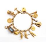 A GOLD CHARM BRACELET