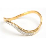 A DIAMOND HINGED BANGLE