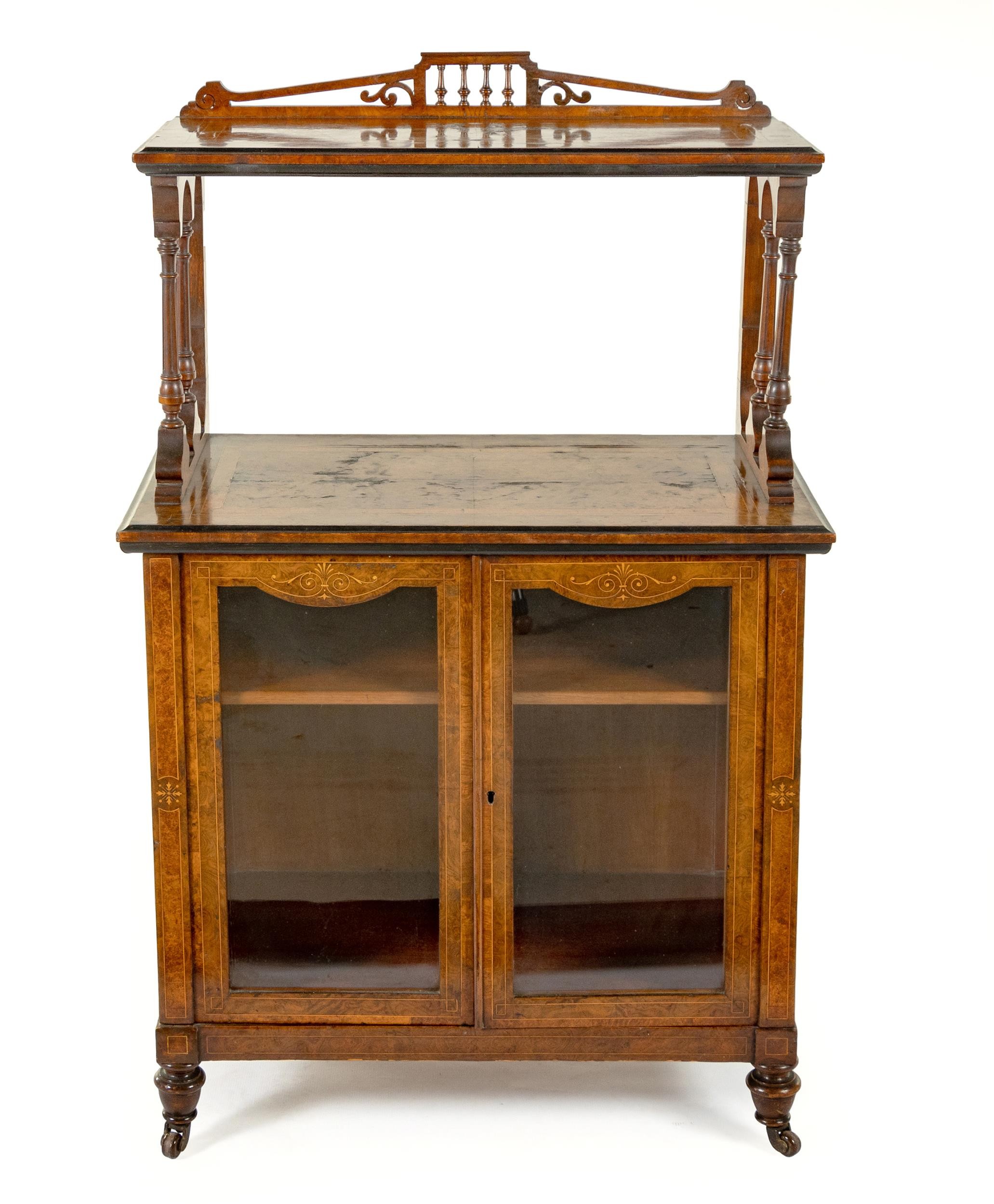 A VICTORIAN WALNUT AND EBONISED CABINET
