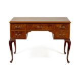 A GEORGE II STYLE MAHOGANY WRITING TABLE