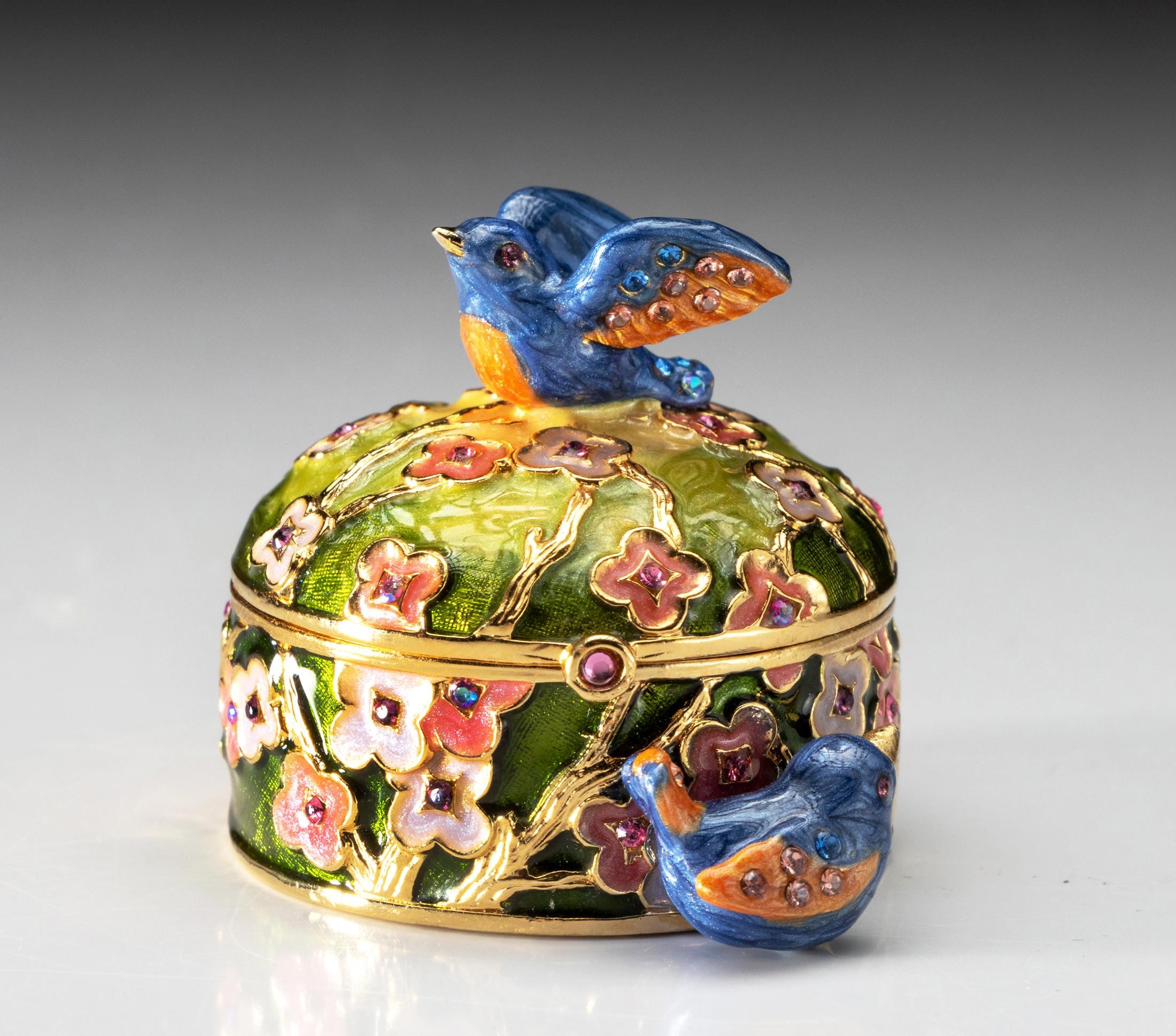 AN ESTEE LAUDER SOLID PERFUME COMPACT, PRECIOUS BIRDS - DESIGNED BY JAY STRONGWATER, 2006