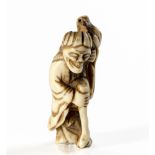 A JAPANESE BONE NETSUKE OF GAMA SENNIN, EDO PERIOD, 1603 - 1867