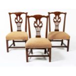 A SET OF THREE GEORGE III ELM DINING CHAIRS