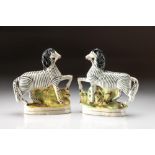 A PAIR OF STAFFORDSHIRE FLATBACK ZEBRAS, MID 19TH CENTURY