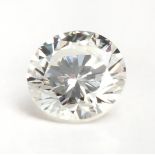 AN UNMOUNTED CERTIFIED ROUND BRILLIANT-CUT DIAMOND