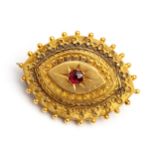 A GEM-SET BROOCH