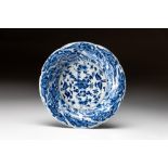 A CHINESE BLUE AND WHITE 'HIBISCUS' PLATE, QING DYNASTY, KANGXI, 1662 - 1722