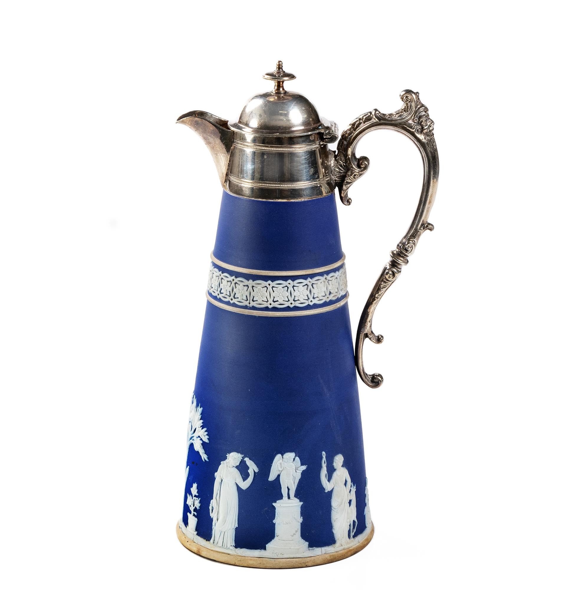 A WEDGWOOD DARK BLUE JASPER WARE CLARET PITCHER WITH SILVERPLATED COVER, CIRCA 1900
