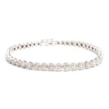 A DIAMOND TENNIS BRACELET