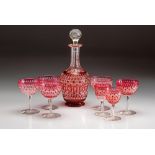 A CRANBERRY CUT-CRYSTAL DECANTER