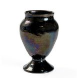 A RARE LINN WARE BLACK PEDESTAL VASE